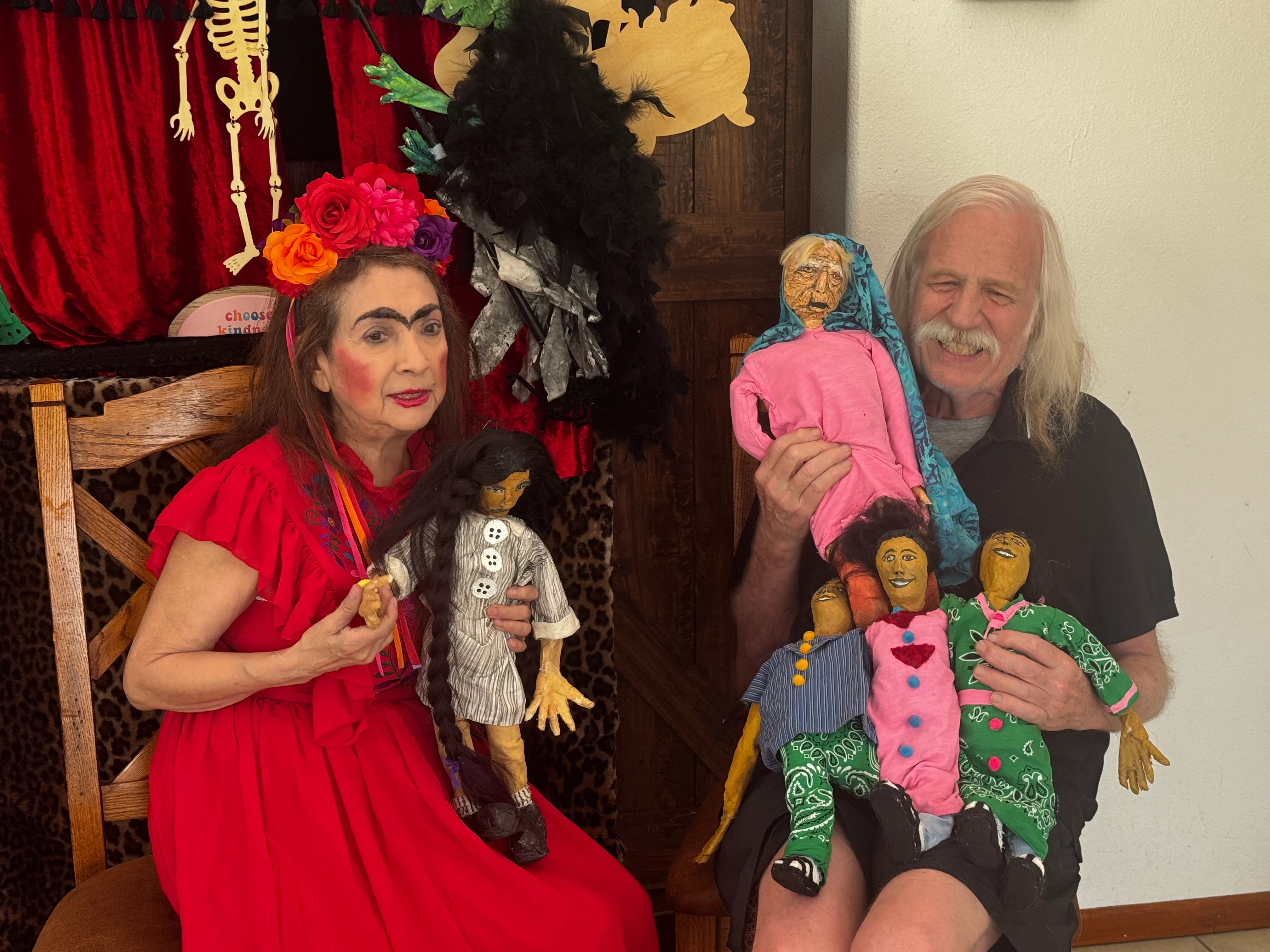Nancy Perez Fugere and puppeteer holding book characters