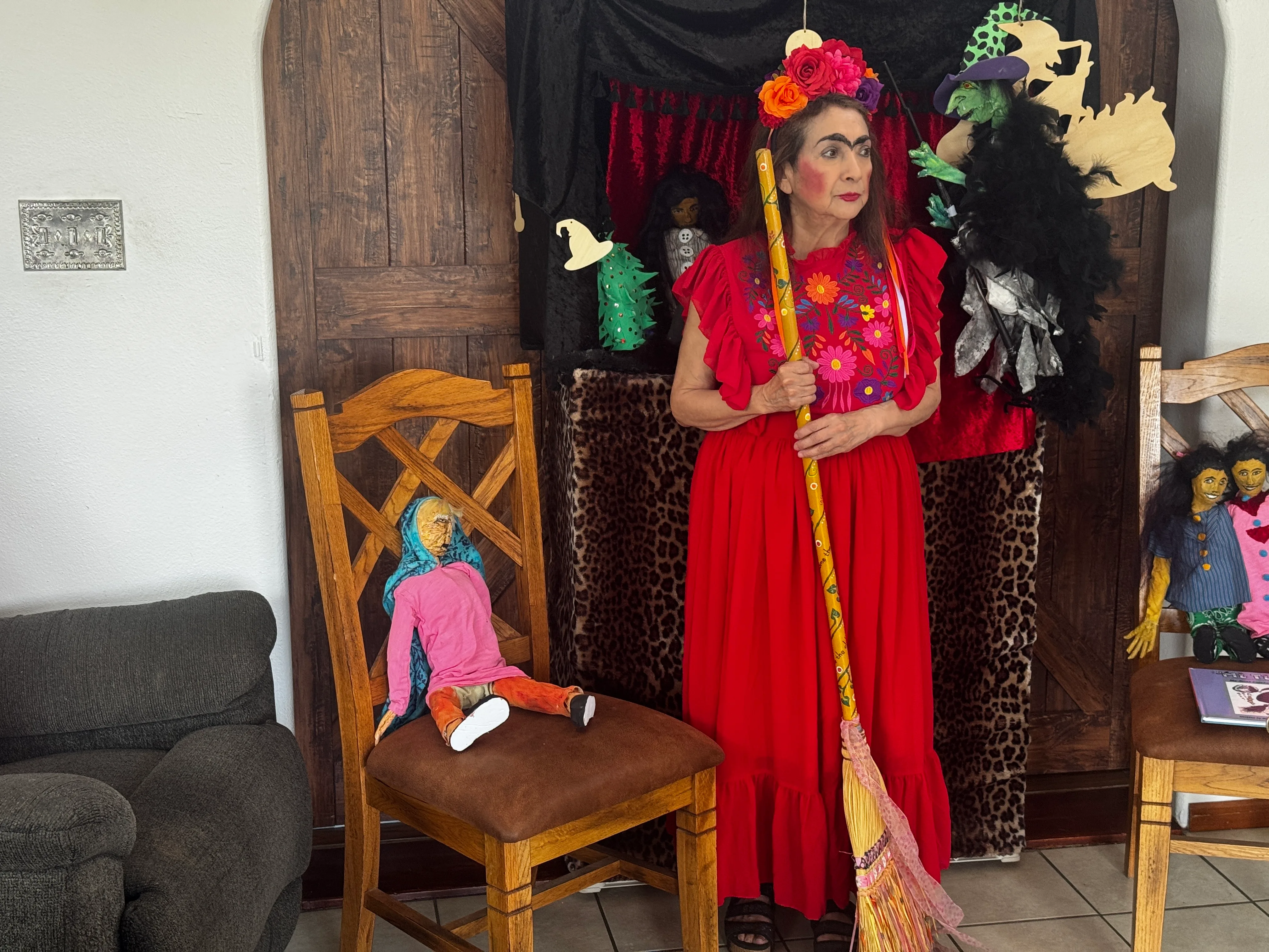 Full stage setup with puppets and traditional decor